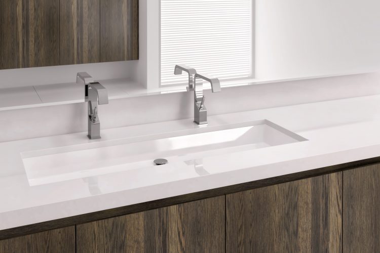 Undermount sinks by Wetstyle. Large rectangular sink with double faucets
