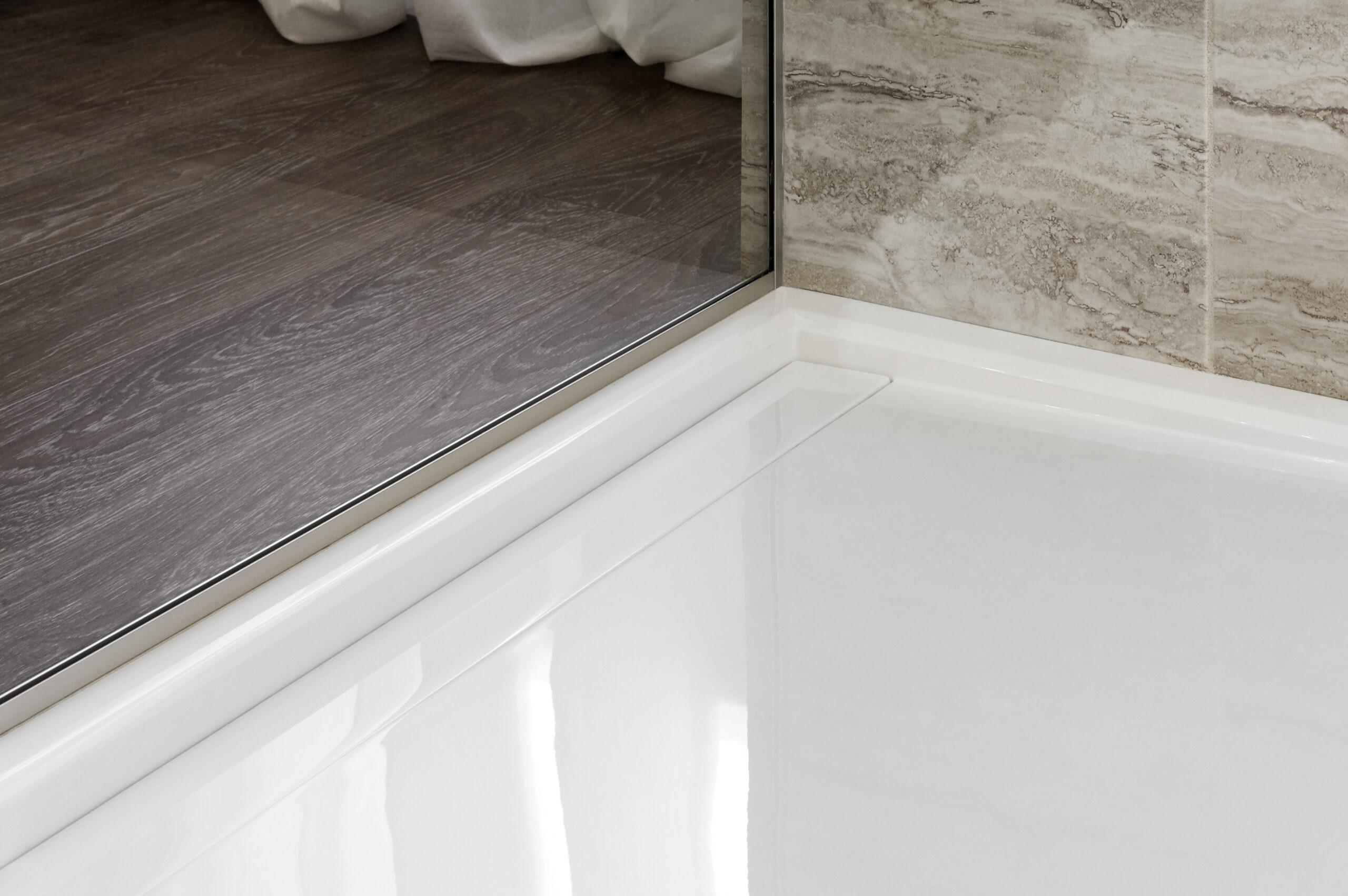 This image shows the floor of the entrance of a shower. 