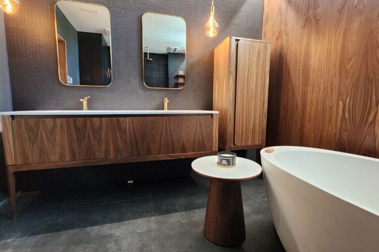 Luxury Bathroom Vanitiy in Walnut finish, freestanding bathtub and custom linen cabinets