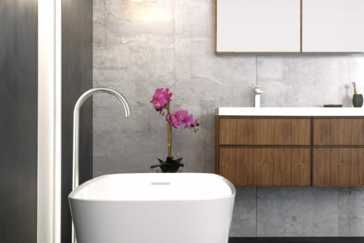 Freestanding bathtub with a white matte finish and wood vanity with white countertop